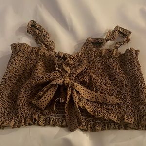 Tan crop top with black dots